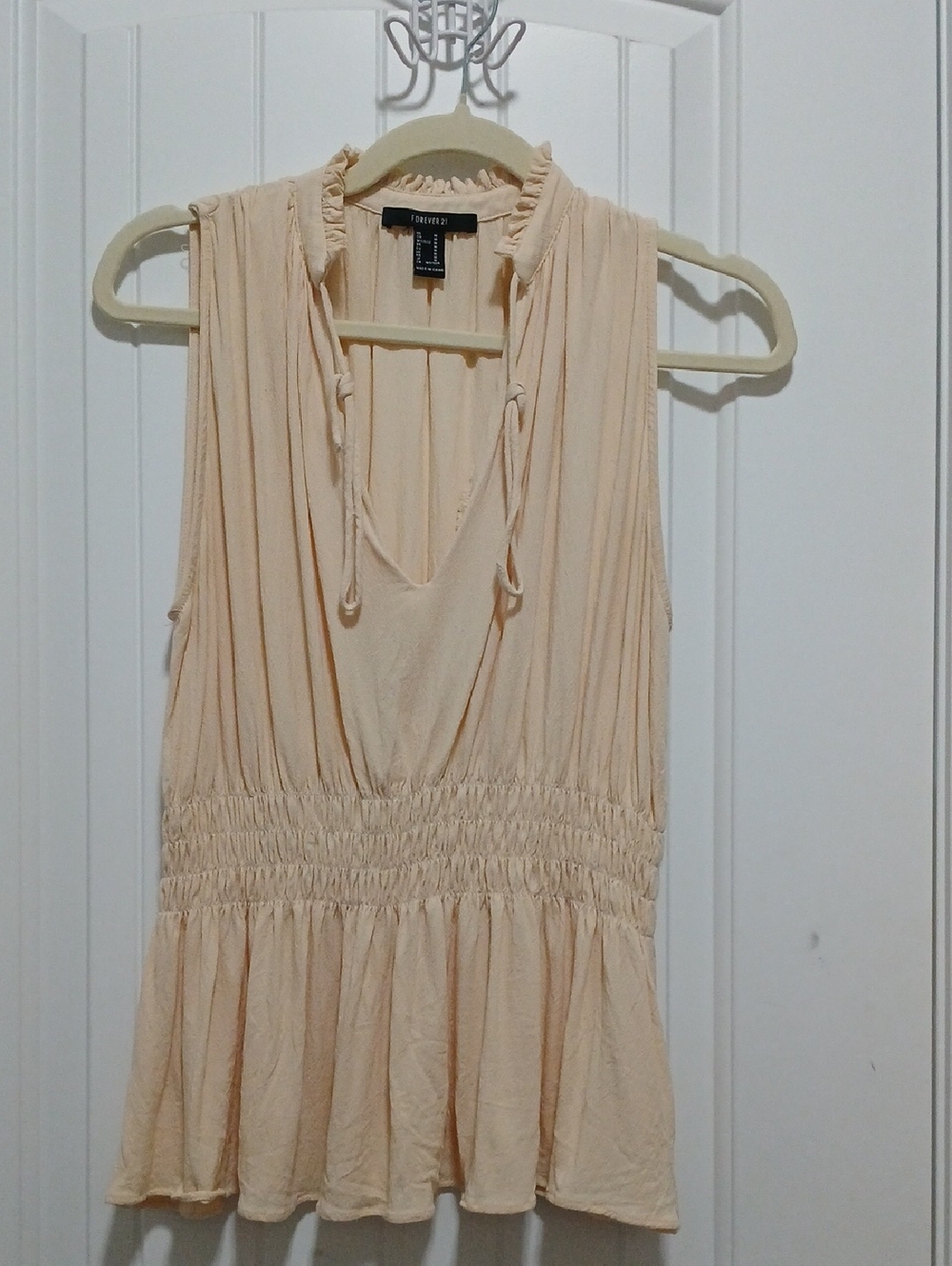 Forever 21 Cream Sleeveless Ruffle V-Neck Peplum Top